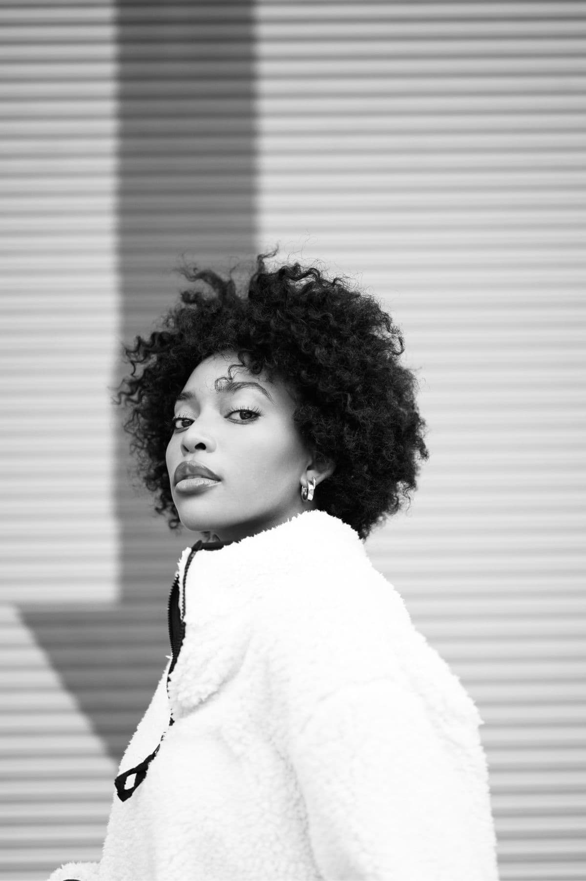 Black and white portrait photograph of this episode's guest