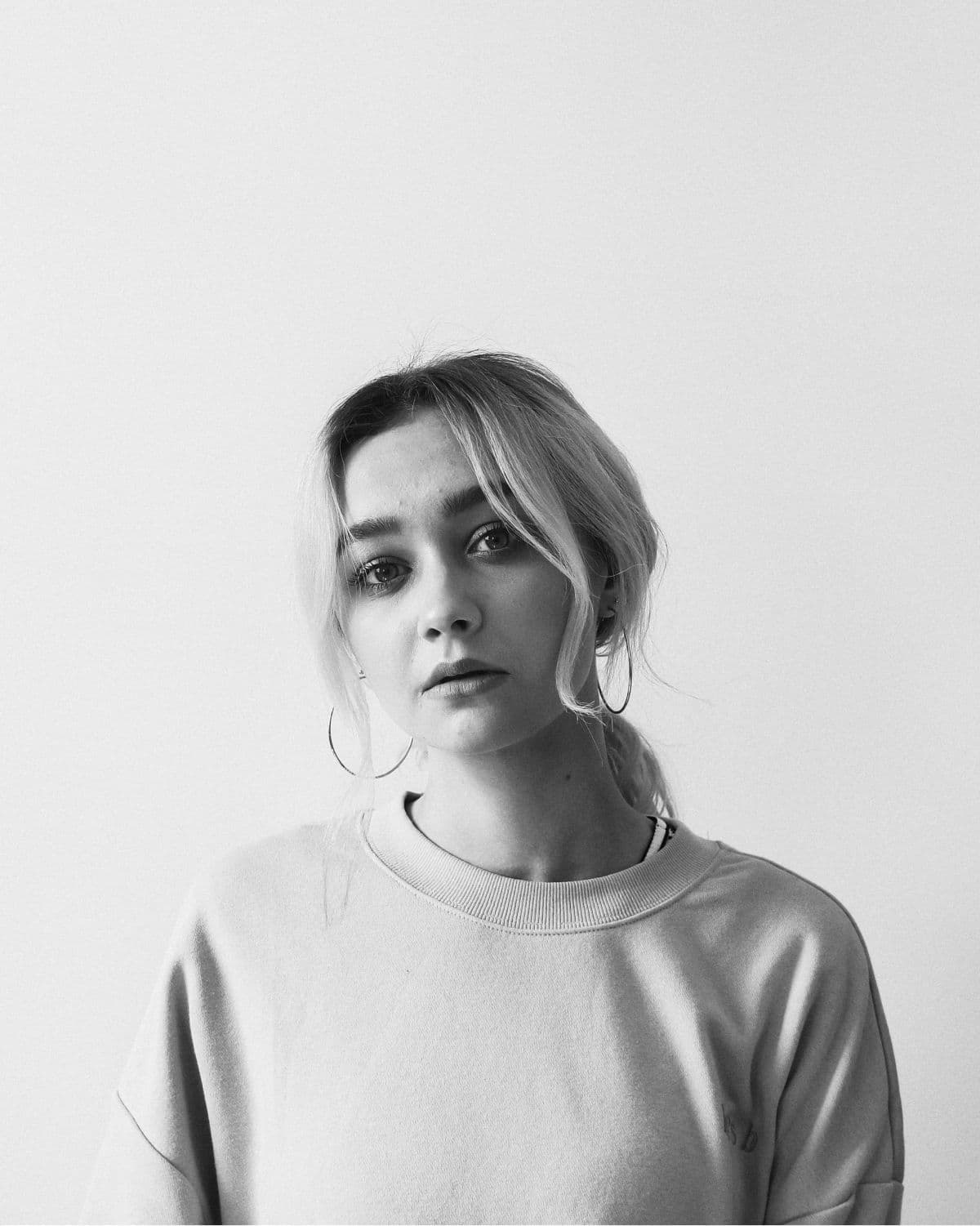 Black and white portrait photograph of this episode's guest