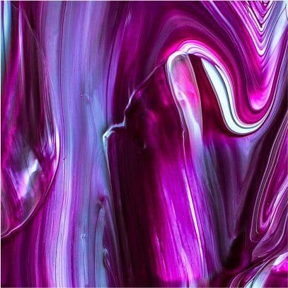 Swirled magenta and violet paint forming a glossy marbled texture
