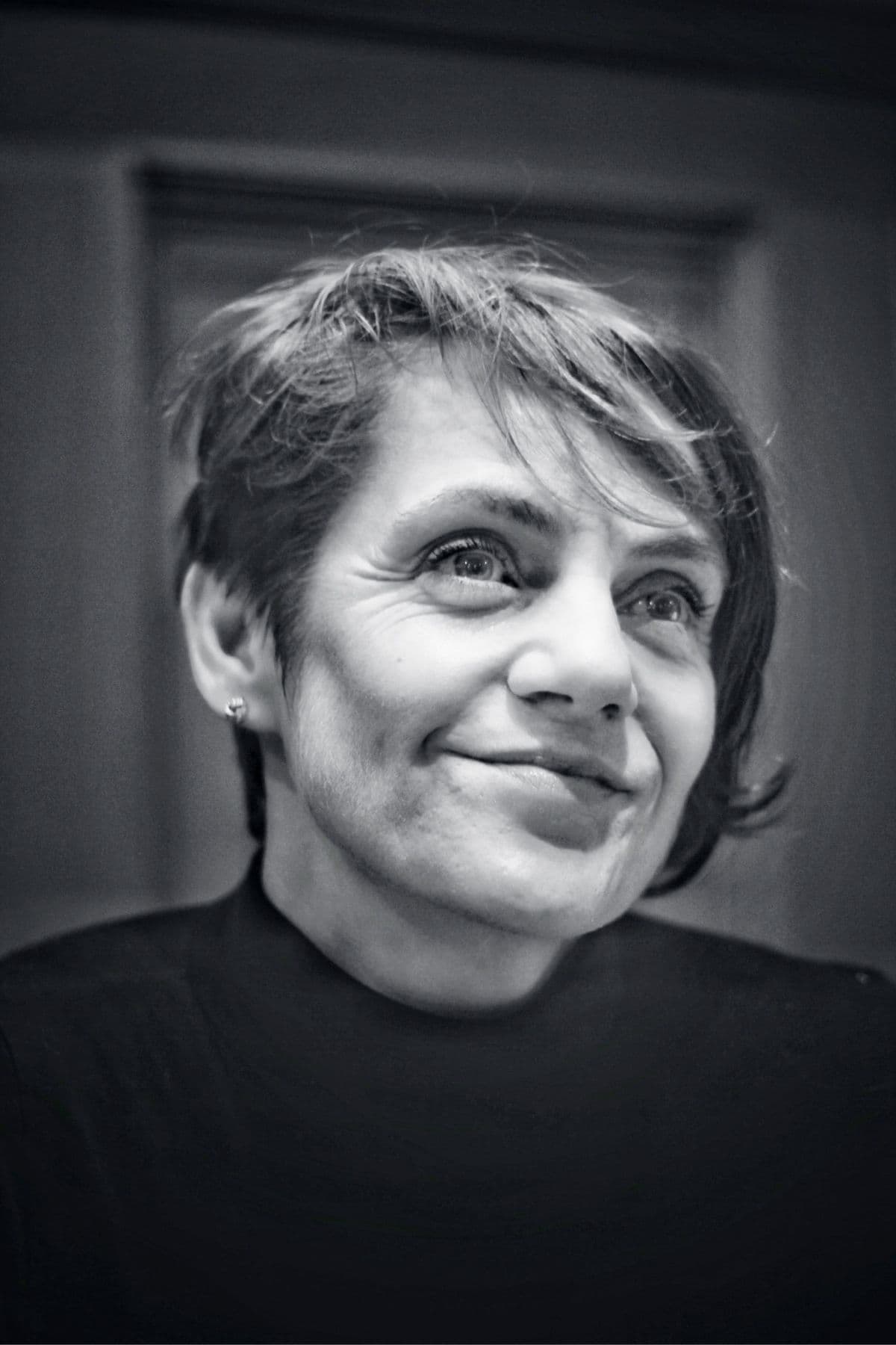 Black and white portrait photograph of this episode's guest
